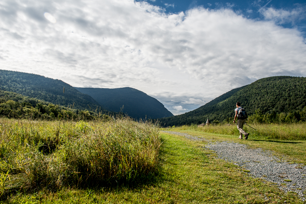 Hiker departing Highland Center, Crawford Notch